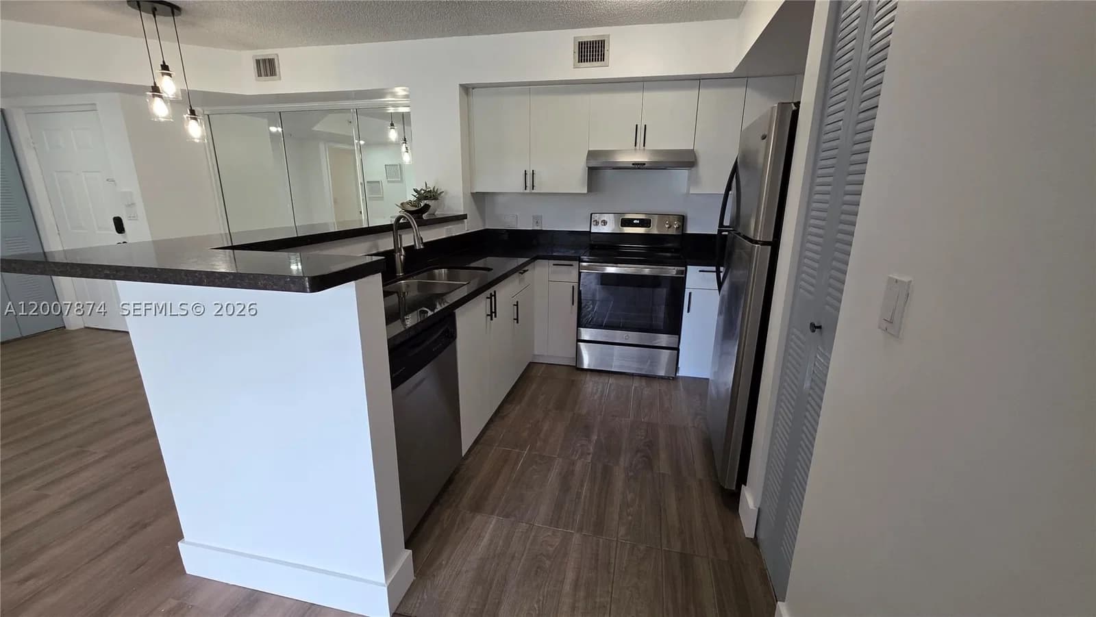 2+1 Condo — 12136 Saint Andrews Pl #108, Miramar, FL 33025