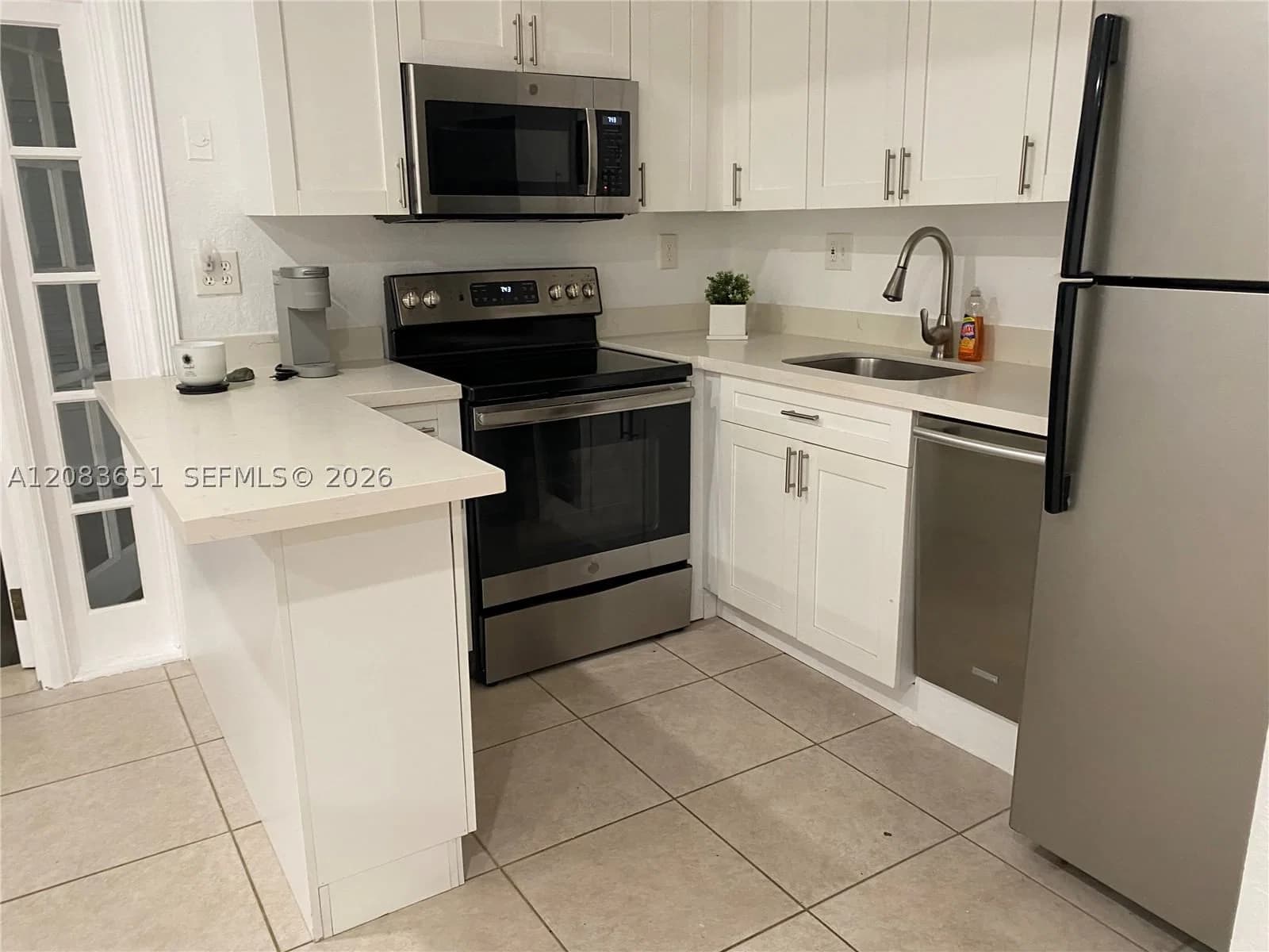 1+1 Condo — 1 Edgewater Dr + DEN #103, Coral Gables, FL 33133