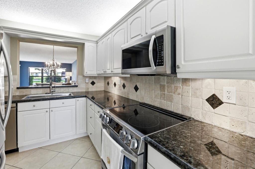 2+1 Condo — 5710 Princess Palm Court #B