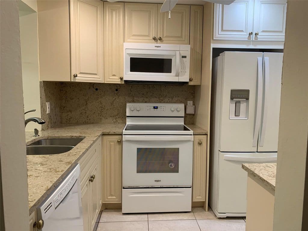 2-bedroom Condo — 9460 Poinciana Place #203