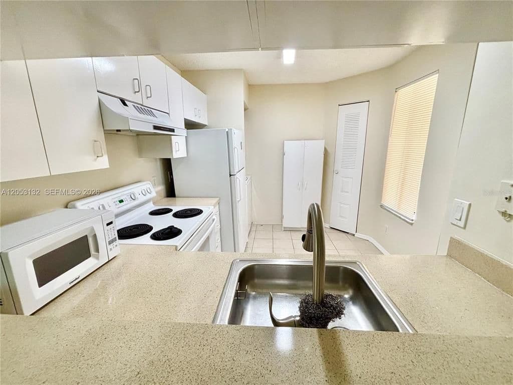 2+1 Condo — 1040 CORAL SPRINGS CLUB #1040