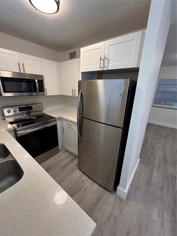 2+1 Condo — 5960 W 25th Ct APT 102