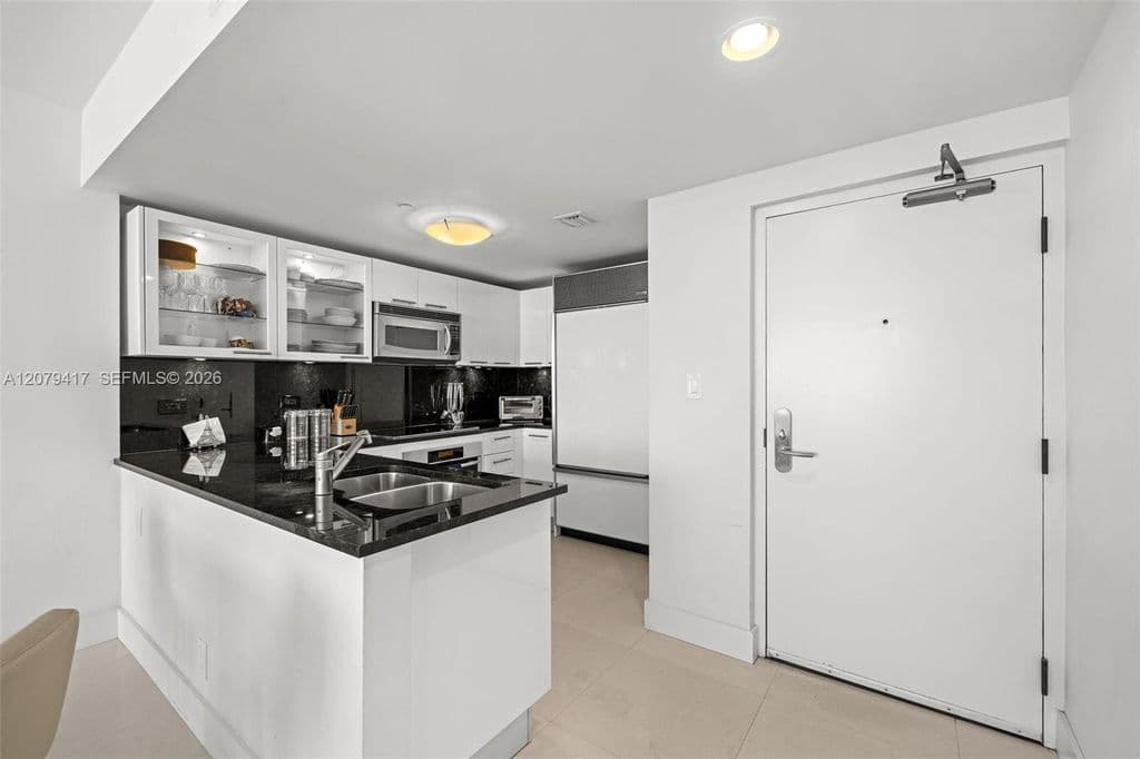 1+1 Condo — 6801 Collins Ave #1401