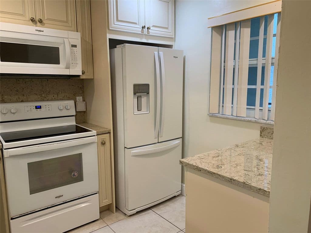 2-bedroom Condo — 9460 Poinciana Place #203