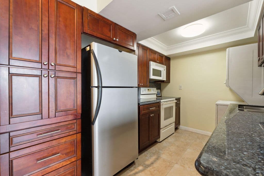 2+1 Condo — 734 Executive Center Drive #23