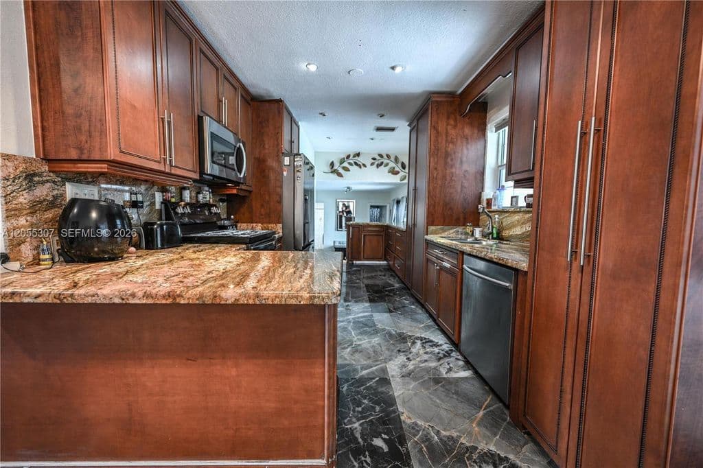 3-bedroom Single-Family Home — 7400 NW 1st Ct