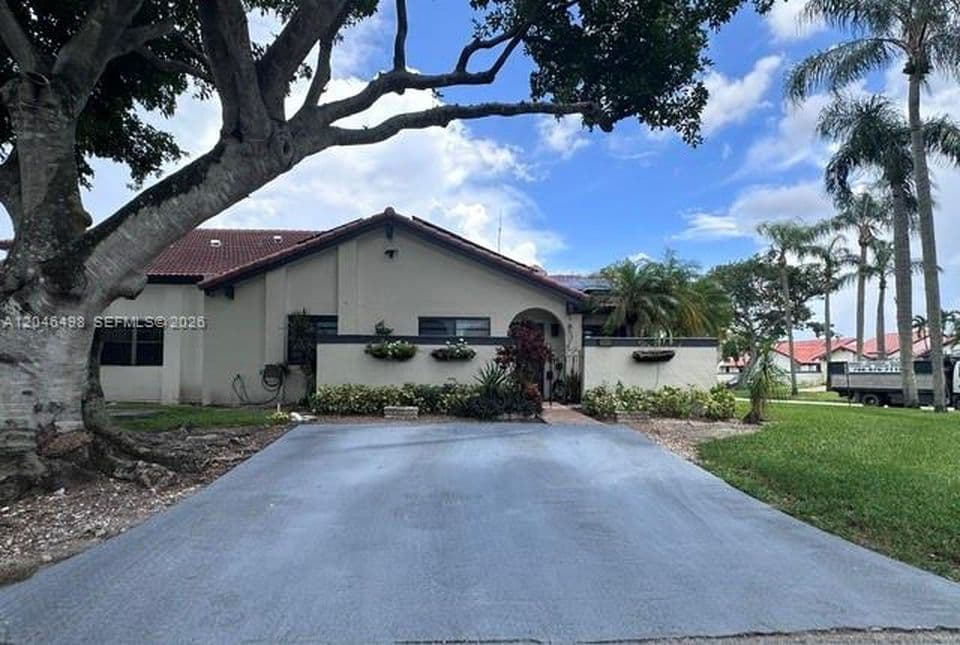3-bedroom Property — 6633 NW 178th Ter
