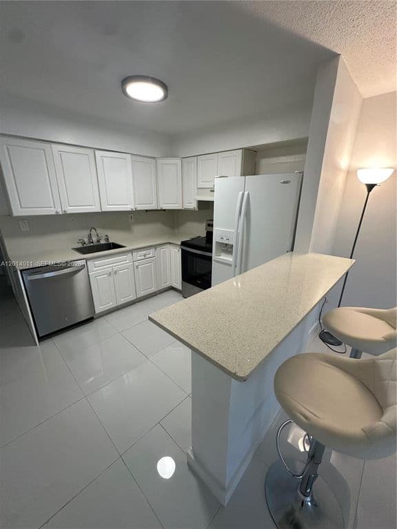 1+1 Condo — 1120 102nd St APT 4
