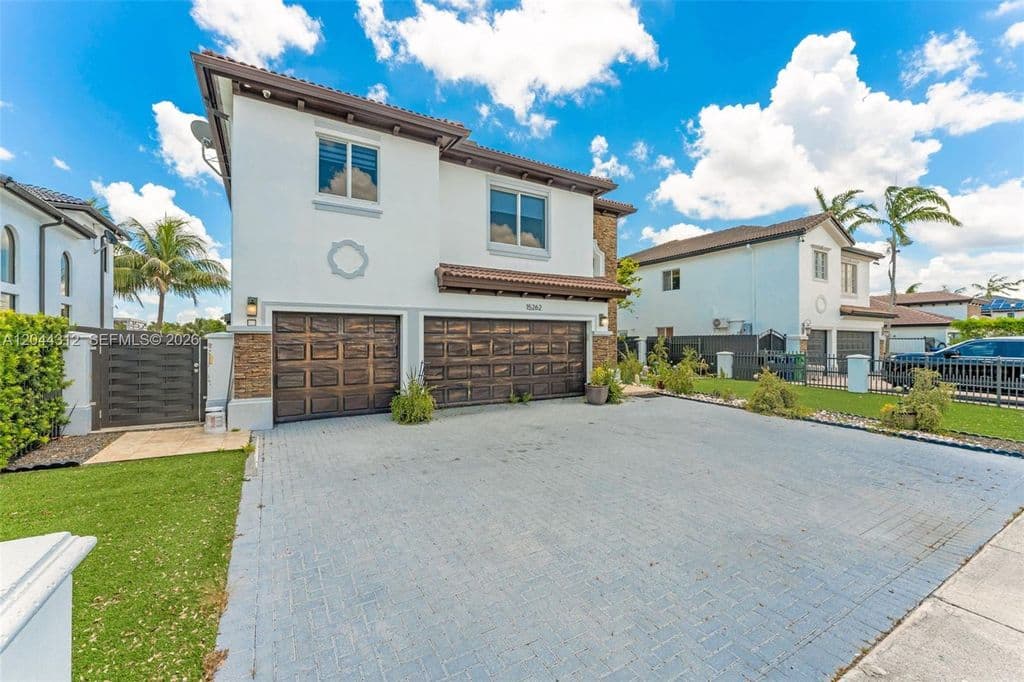 6-bedroom Single-Family Home — 15262 SW 11th St