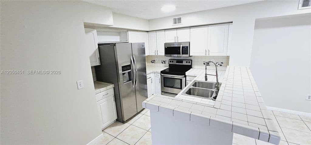 2-bedroom Condo — 1707 Village Blvd APT 208