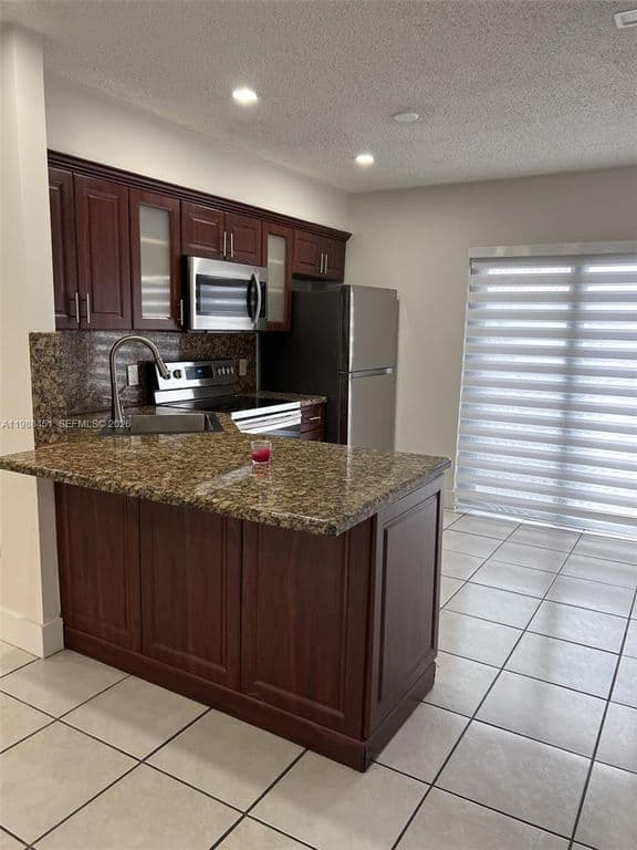 2+1 Condo — 5480 W 21st Ct APT 404