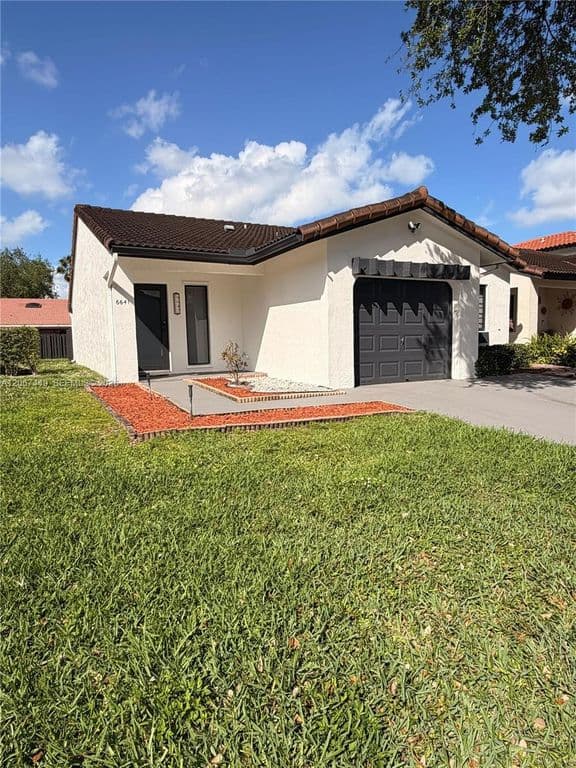 3-bedroom Property — 6641 NW 174th Ter