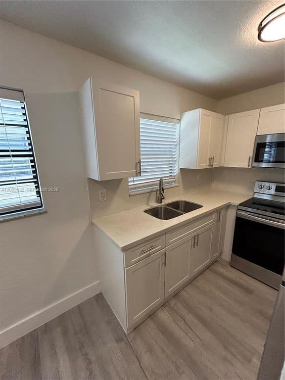 2+1 Condo — 5960 W 25th Ct APT 102