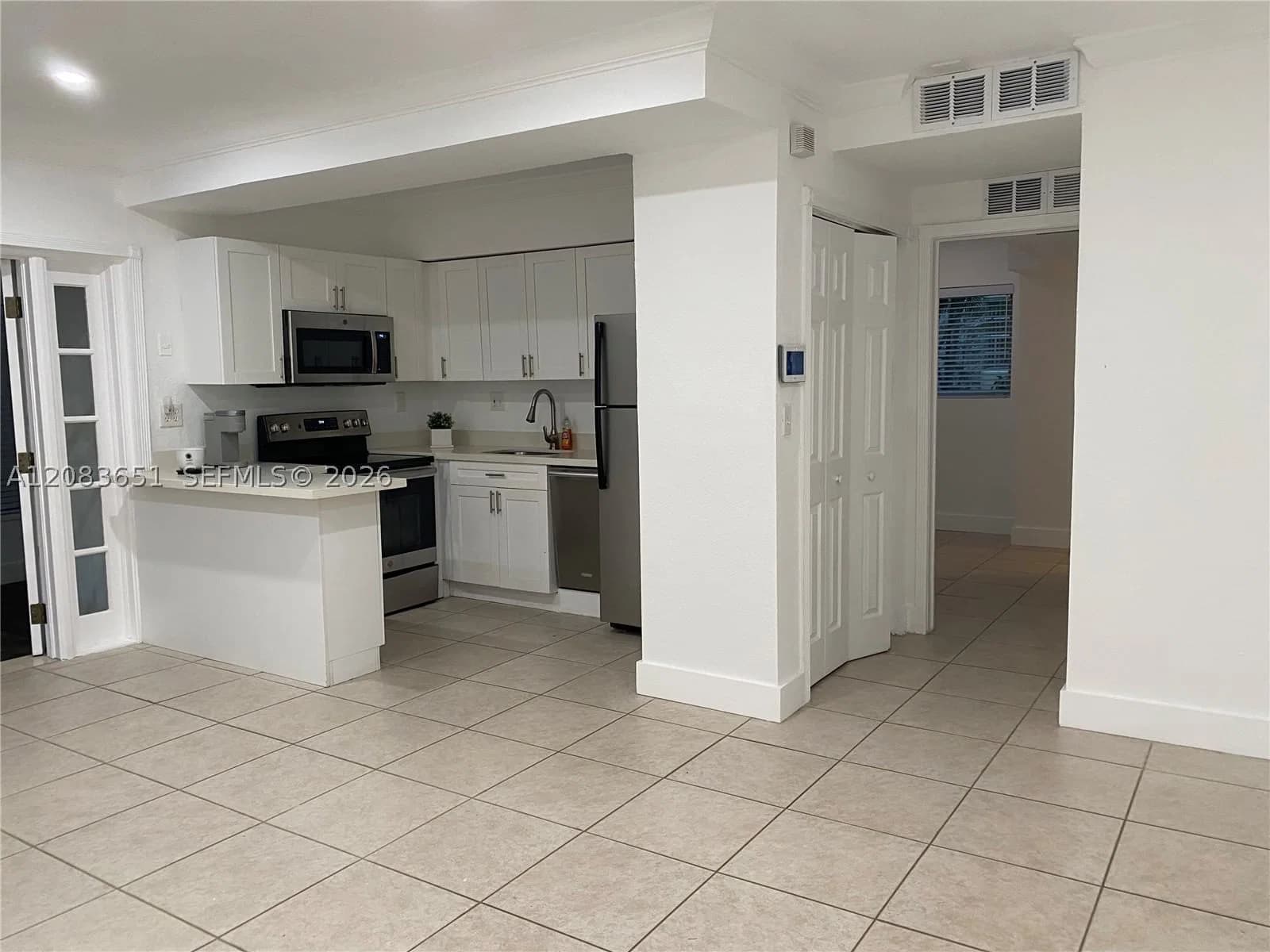 1+1 Condo — 1 Edgewater Dr + DEN #103, Coral Gables, FL 33133
